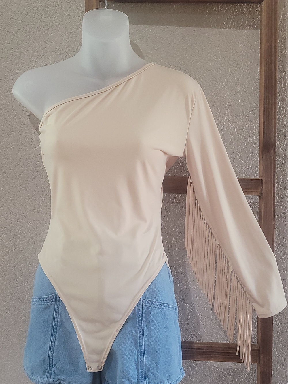 Lucky & Blessed One-Shoulder Fringe Bodysuit in Beige